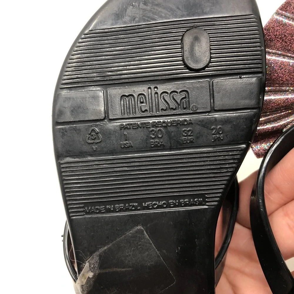 Melissa Mel Harmonic Bow Vi INF Flip Flops Girls 1 Black Glitter Scented